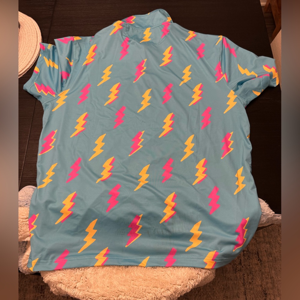 Chubbies Blue Shirt with Pink and Yellow Lightning Bolts